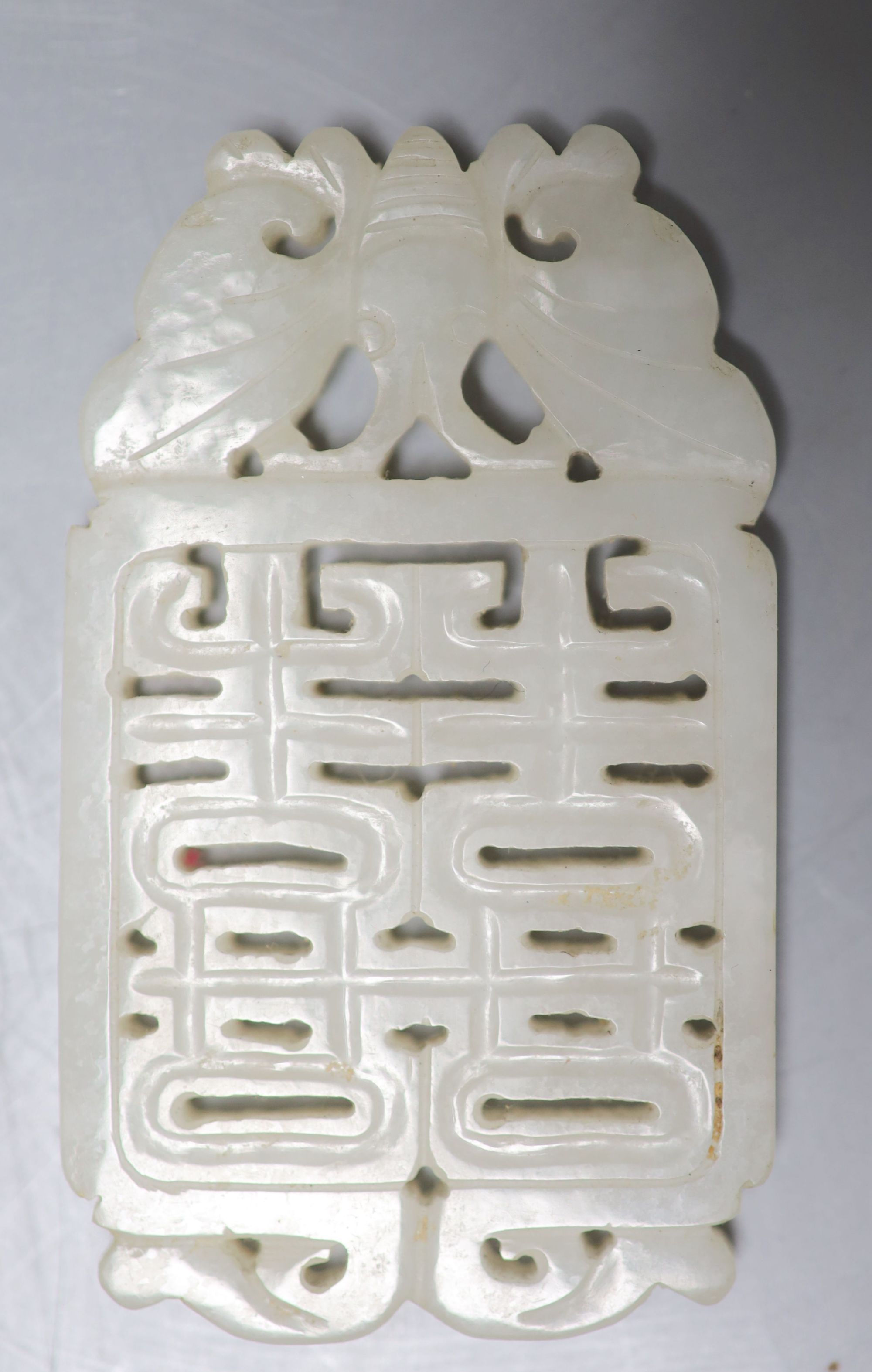 A 19th century Chinese pale celadon jade Shuangxi pendant plaque , length 7cm